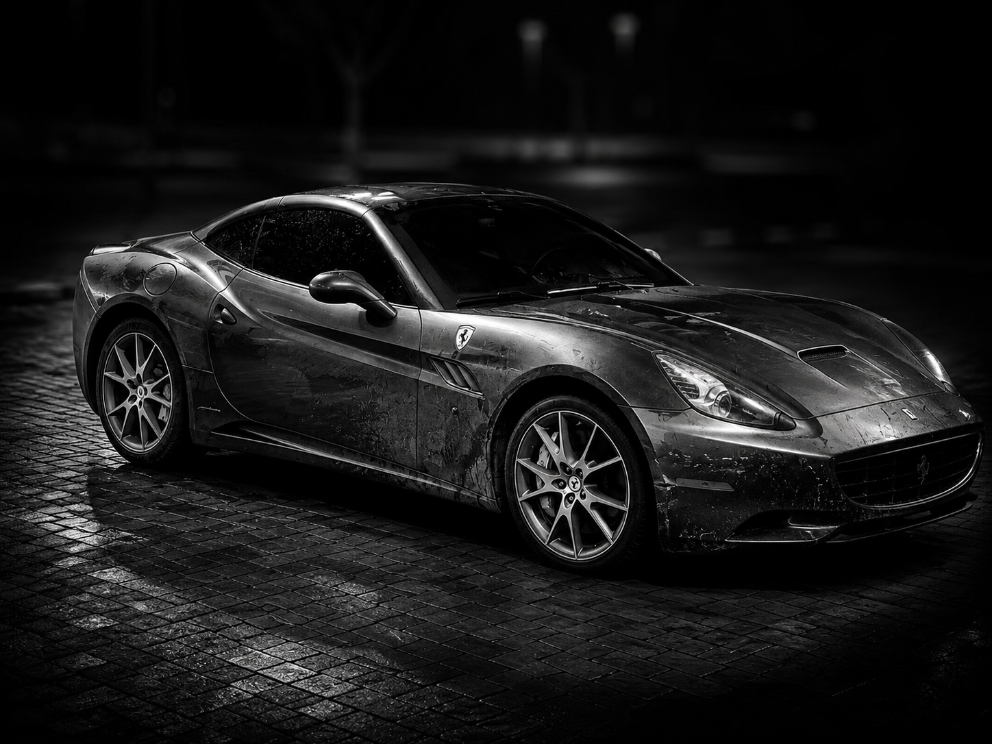Ferrari in the rain at night